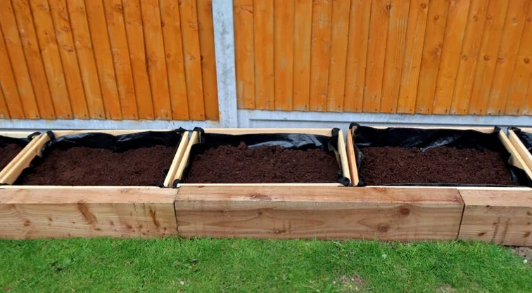 raised garden bed bottom layer
